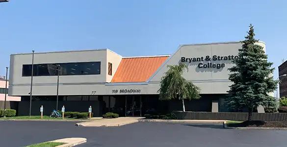Exterior view of Bryant & Stratton College building on a sunny day, located at 1099 Broadway.
