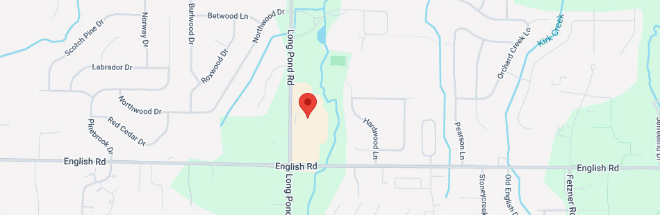 Map showing Long Pond Rd intersecting with English Rd. A red location marker is placed north of the intersection, near Heywood Ln. Several nearby streets and a creek are also visible.