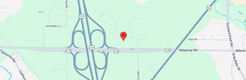 A map showing a highway interchange near Milestip Rd and Orchard Park Rd in NY, with a red location pin dropped in the center. Nearby roads and some street names are visible on a light green background.