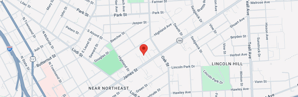 A digital map shows streets and landmarks in the Near Northeast and Lincoln Hill neighborhoods, highlighting areas near several Syracuse colleges. A red location pin is centered on Highland Avenue near the intersection with James Street.