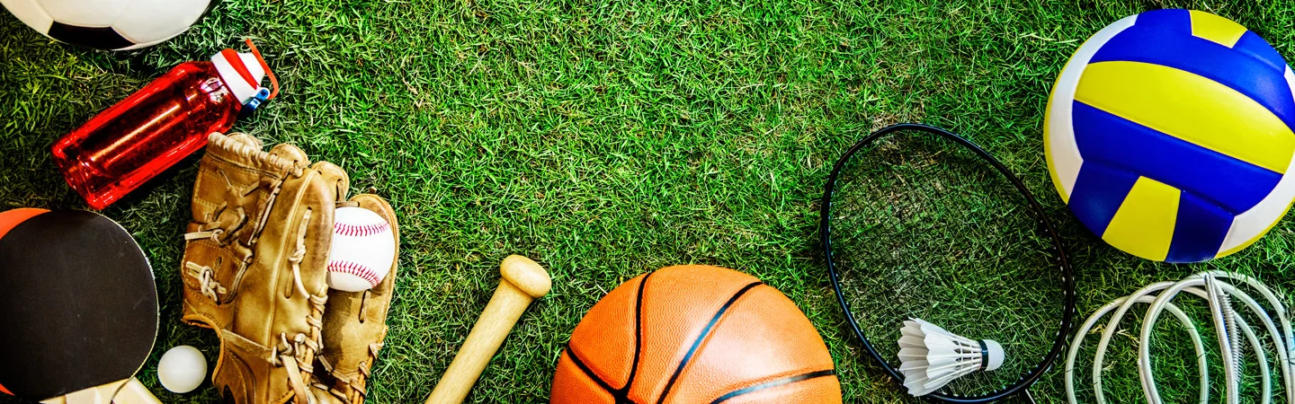 Various sports equipment, including a soccer ball, baseball glove, basketball, volleyball, shuttlecock, and ping pong paddle.